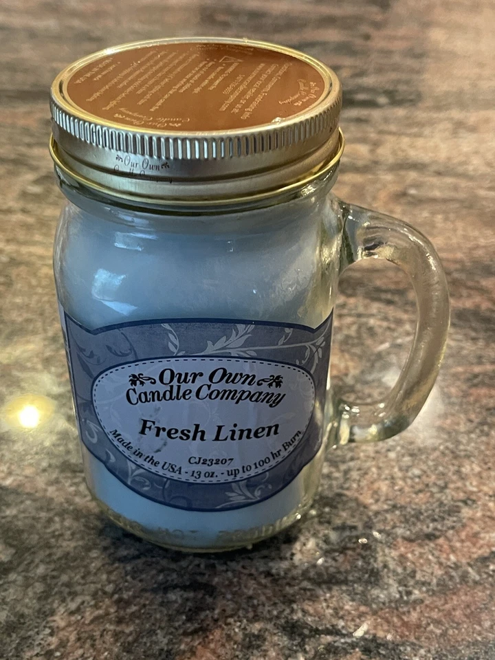  Vela perfumada de lino fresco en tarro de masón de 13 oz de Our Own Candle Company Foto 1 de 4