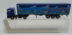 FALLER Ho 1/87 Truck Man F90 Mid Trailer Haischau Mobile Dolphin Show #1024 - Picture 1 of 8