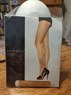 Pantimedias Leg Avenue 7432 con estampado de tatuaje transparente de spandex Foto 1 de 4