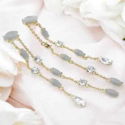 Brincos lineares de fio duplo cinza Givenchy em cinza e ouro. - Imagem 1 de 4