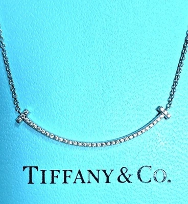 $3,900  TIFFANY & CO. T SMILE DIAMOND 18K WHITE GOLD SMALL NECKLACE PENDANT - Image 1 of 4