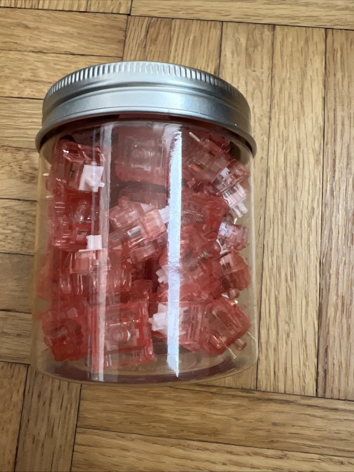 Mechanical Keyboard Switches – Red Transparent – Jar of 70+ Linear Switches - Image 1 of 1