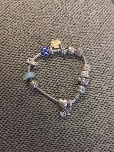Auténtica pulsera Pandora de plata esterlina con 13 dijes y clip de seguridad - Imagen 1 de 2