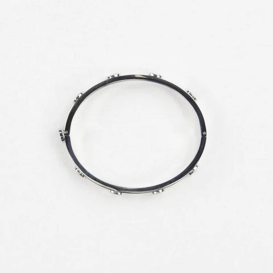 Brazalete con bisagra de acero inoxidable y cristal plateado TORY BURCH S PRECIO DE VENTA SUGERIDO POR EL FABRICANTE 195 Foto 1 de 4