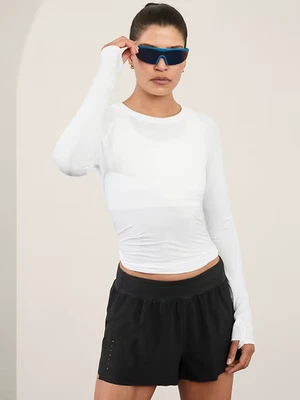 Top sin costuras ATHLETA blanco Momentum talla extra pequeño #530524 Foto 1 de 3