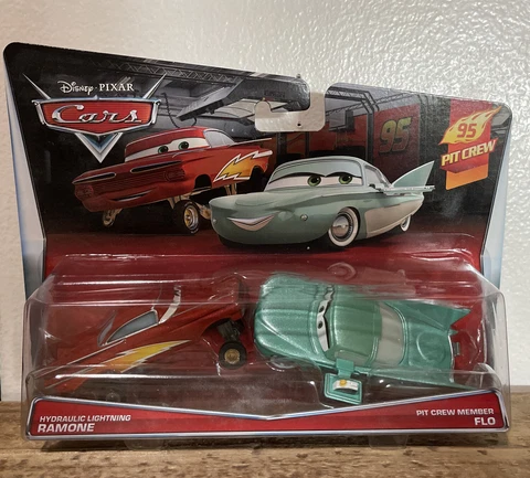 Disney Pixar Cars 2 Hydraulic Lightning Ramone & Pit Crew Member Flo Cover