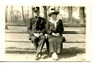 Couple On Wood Bench-Man Wears Conductor Cap-Rppc-Vintage Real Photo Postcard