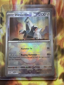 Duraludon (Master Ball Pattern) 069/131 Prismatic Evolutions NEAR MINT NM - Bild 1 von 2