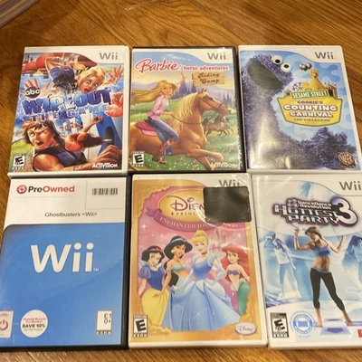 6 Nintendo Wii Games & Case Wipeout, Dance Dance, Ghostbuster, Barbie, Enchanted - Image 1 of 4