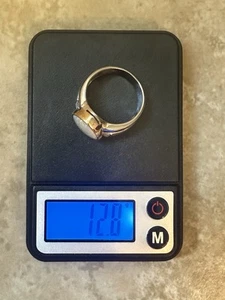 18 Karat Weißgold Ring mit ovalem Opal & 8 Baguette Diamanten - Bild 1 von 16