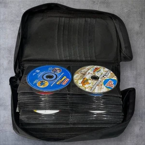 Lot of 65+Kids DVD Binder - Children's Thomas, Nickelodeon, Peanuts, More - Imagen 1 de 13