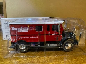 NIB 1/32 ERTL COLLECTABLE, INTERNATIONAL ARMORED TRUCK BANK REPRESENTING “DUNBAR - Picture 1 of 15