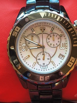 swiss legend mens watch- karamica -330 w.r.-pink/blue hue pearl dial-new battery - image 1 of 4