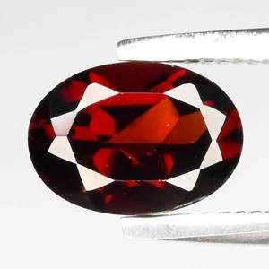 π 1.00ct 7x5mm VVS Oval Natural Reddish Orange Garnet - Africa, Gemstone - Picture 1 of 4