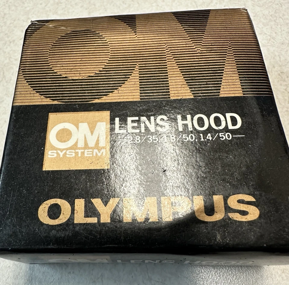 Parasol Olympus OM 49 mm para 50 mm f1,4 50 mm f1,8 35 mm f2,8. Ver fotos Foto 1 de 4