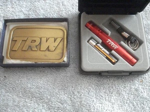 VINTAGE BRASS TRW BELT BUCKLE and TRW MAG-LITE SOLITAIRE LED FLASHLIGHT - Picture 1 of 6