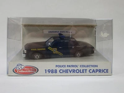 Chevrolet Caprice 1988 diecast rosa blanca policía estatal de Louisiana escala 1:43 Foto 1 de 4