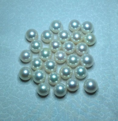 Perlas cultivadas redondas blancas sueltas Foto 1 de 3