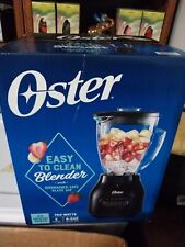 The Black Oster Easy-to-Clean Smoothie Blender with 6-Cup Capacity Glass Jar
