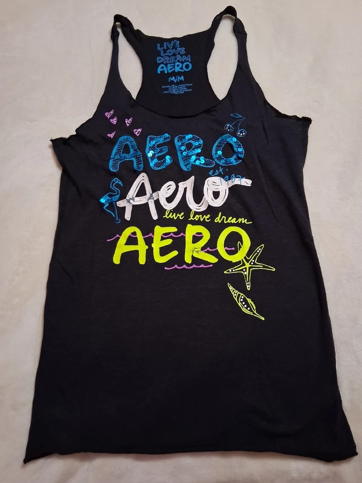 Camiseta sin mangas AERO negra ligera con estampado de neón Beach Vibes Juniors talla mediana  Foto 1 de 4