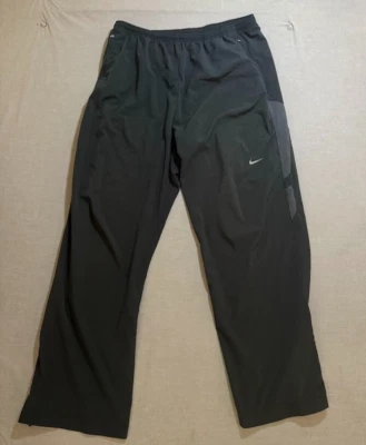 Pantalones para correr Nike DRI FIT adultos grandes negros con logotipo cordón 32x29. Foto 1 de 4