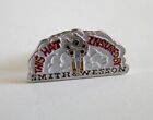 "This Hat Insured By Smith & Wesson" HAT PIN/Lapel Pin NEW-GUARANTEED FOR LIFE