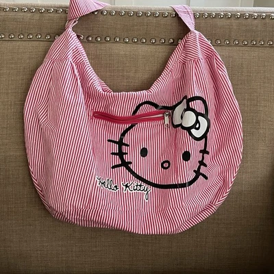 Hello Kitty Sanrio 2012 Rojo Blanco Rayas Cartera Bolso de Lona Mano Cara Arco Usado en Excelente Condición Foto 1 de 4