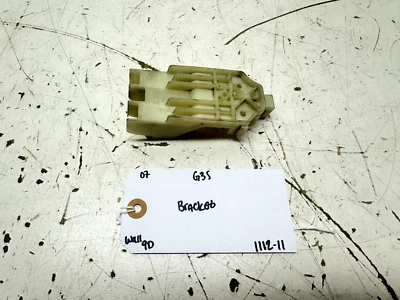 07 08 09 2007 2008 INFINITI G35 G37 FARO OCULTO LÁMPARA LENTE SOPORTE INFERIOR OEM Foto 1 de 4