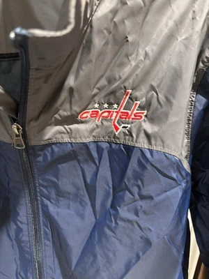 Embroidered Blue and grey Washington Capitals raincoat/jacket with hood size med - Image 1 of 4
