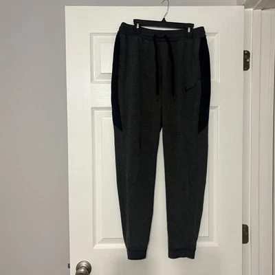 Pantalones de baloncesto Nike Dri-Fit para hombre L gris negro bolsillo con cremallera Foto 1 de 4