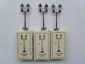 VEB Plasticart - escala H0 - 3x lámpara de bulevar de dos brazos en embalaje original - PROBADO - Imagen 1 de 3