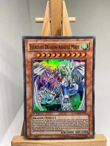 Stardust Dragon/Assault Mode - Super Rare 1st Edition DP09-EN001 - LP - YuGiOh - Picture 1 of 2