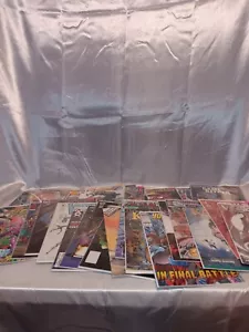Lot Of 42 Random Picked Comic Books-All Laminated - Picture 1 of 4