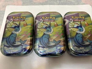 Pokémon Prismatic Evolutions Mini Tin Vaporeon Factory Sealed Neu! Lot (3) - Bild 1 von 5
