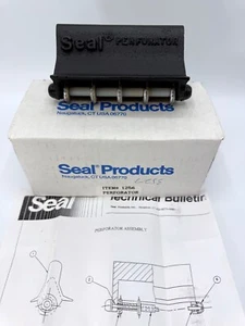 Perforador de hierro fundido negro Seal Products artículo #1256 caja original con instrucciones - Imagen 1 de 14