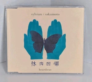 David Sylvian & Ryuichi Sakamoto - Heartbeat Tainai Kaiki II - 1992 UK CD Single - Picture 1 of 7