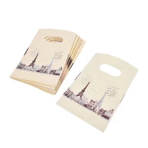100pcs Yellow Eiffel Tower Packaging Bags Plastic Shopping Bags With Handle j0 - Picture 1 of 12