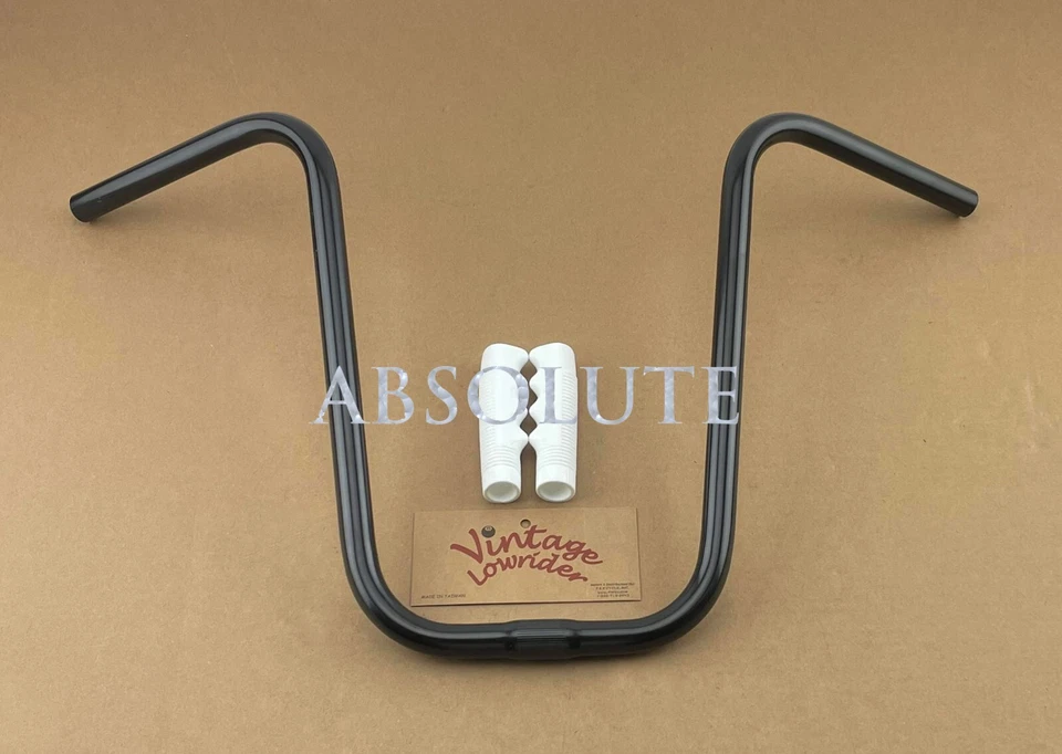 VINTAGE LOWRIDER 15" RISE U HANDLEBAR 25.4MM IN BLACK W/ WHITE LOWRIDER GRIPS. - Image 1 of 1