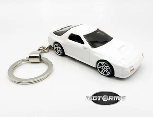 Schlüsselanhänger Mazda Savanna RX7 1989 '89 weiß Auto selten Neuheit 1:64 Diecast - Bild 1 von 4