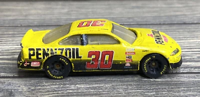 Coche de carreras Pennzoil amarillo Pennzoil 1996 de colección modelo de coche fundido a presión Foto 1 de 4