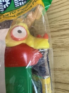 Pez Spender I-SAUR Pez-A-Saurs grüner Stiel neu im Beutel 90er Jahre - Bild 1 von 3