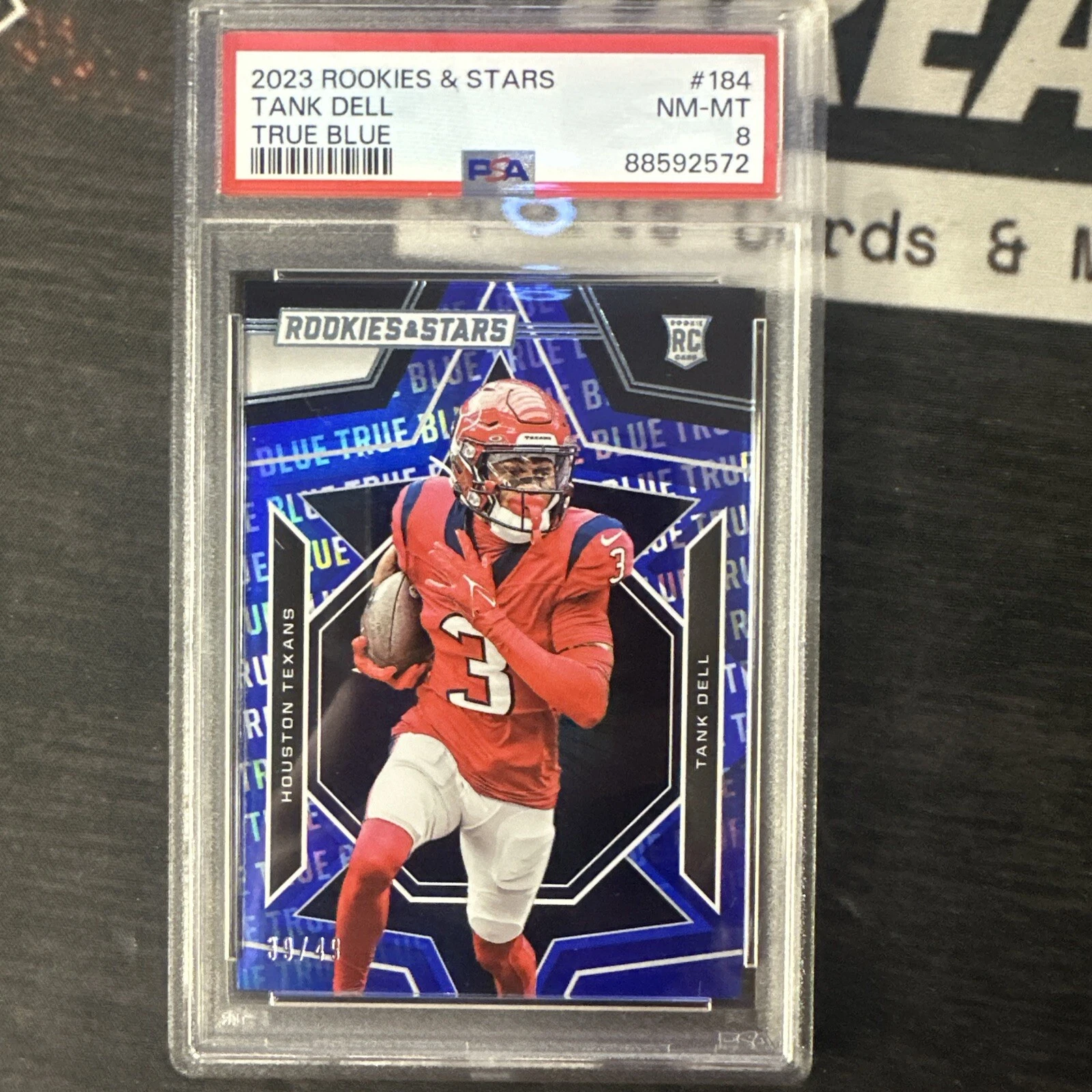 Tank Dell 2023 Panini Rookies & Stars Rookie True Blue #184 #39/49 (RC) Texans