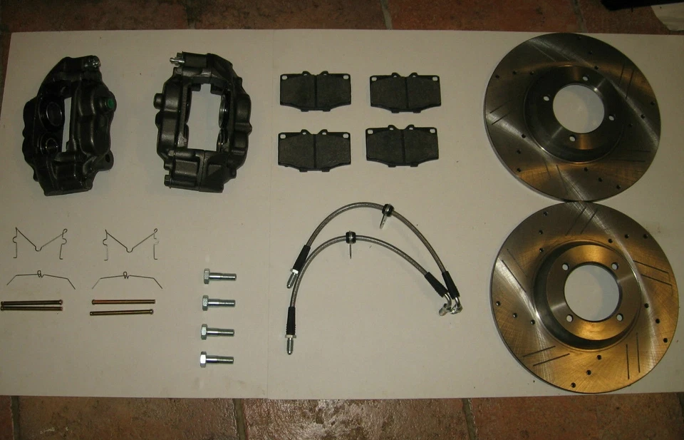 Nuevo kit de frenos grandes de rendimiento pinzas rotores mangueras etc. Triumph TR6 TR250 TR4A Foto 1 de 2