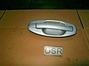 MANIJA PUERTA EXTERIOR TRASERA LADO CONDUCTOR OFFSIDE HYUNDAI SANTA FE 2003 PLATEADA LL - Imagen 1 de 1