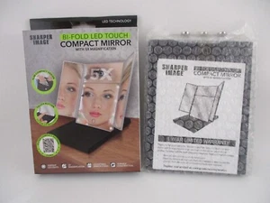 SHARPER IMAGE BI-FOLD LED TOUCH COMPACT MIRROR W/ 5X MAGNIFICATION ZEBRA *NIB* - Picture 1 of 3