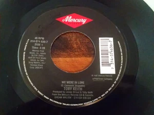 Toby Keith 45 rpm record "We Were in Love/Double Wide Paradise" excellent condit - Picture 1 of 3