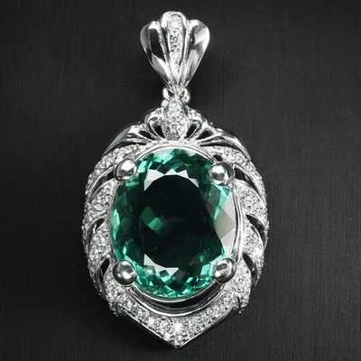 Preciosos colgantes de oro blanco de plata de ley 925 de 35,20 quilates de turmalina verde azulado Foto 1 de 4
