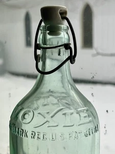 11" Antique Moxie Green Embossed Soda Water Glass Bottle Porcelain Stopper - Picture 1 of 8