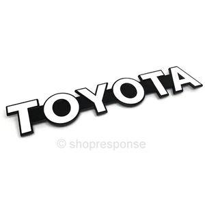 OEM Toyota 85-87 Land Cruiser BJ70 Front Grill TOYOTA Emblem Badge 75311-90K00 - Picture 1 of 2