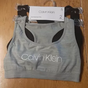 NUEVO CON ETIQUETAS CALVIN KLEIN Juego de 2 Suéteres Sin Costuras Gris/Negro SUJETADOR DEPORTIVO MED 7-8 - Imagen 1 de 3